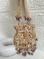 Metallic lavender colored Tiny Pearl Beads Golden Creamy Potli Bag - Small