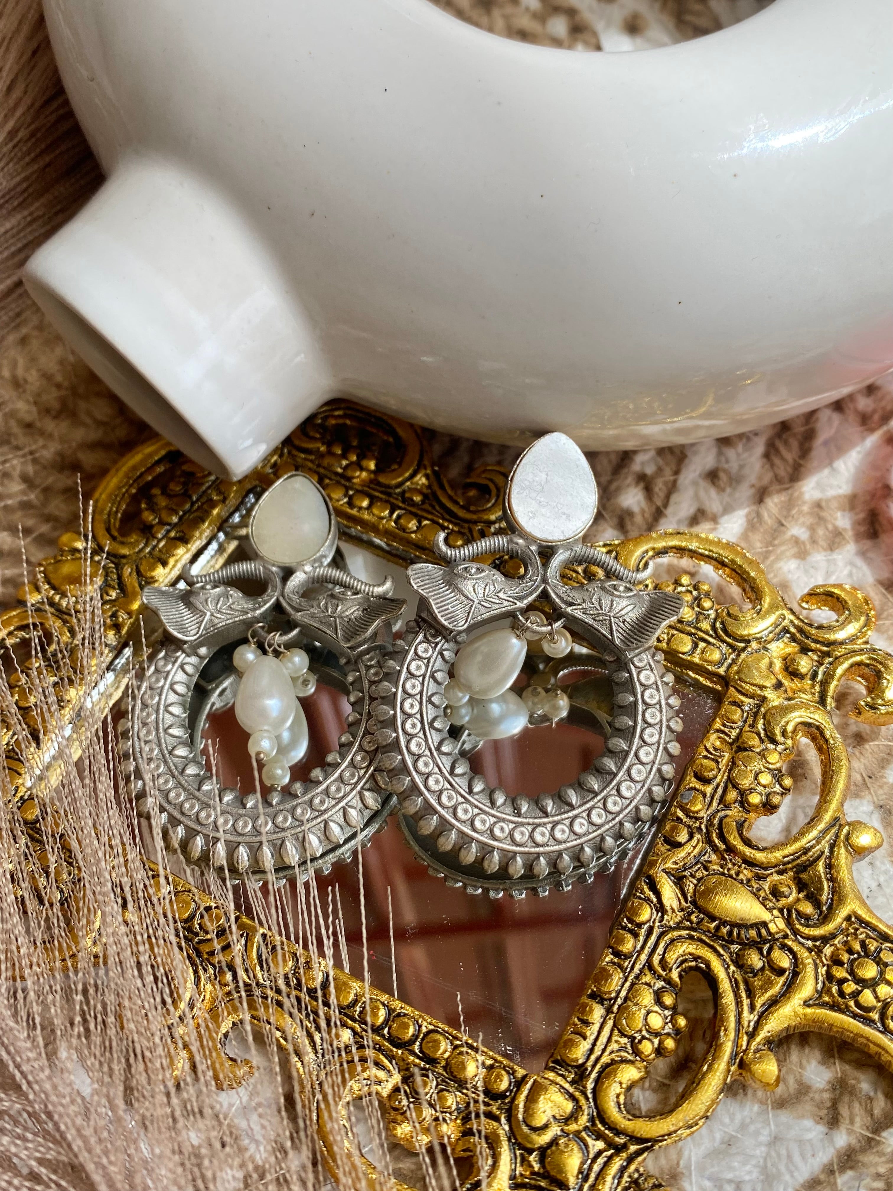 White Stoned Silverlookalike Earrings