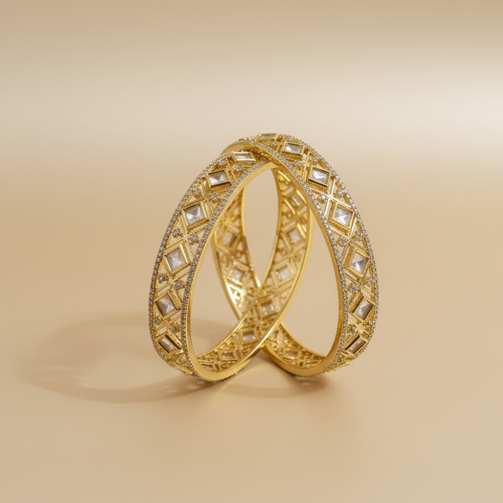 Gold bracelet with intricate design on a beige background