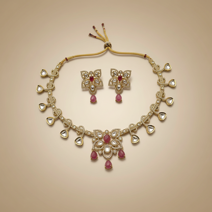 Jewelry set with necklace and earrings on a beige background