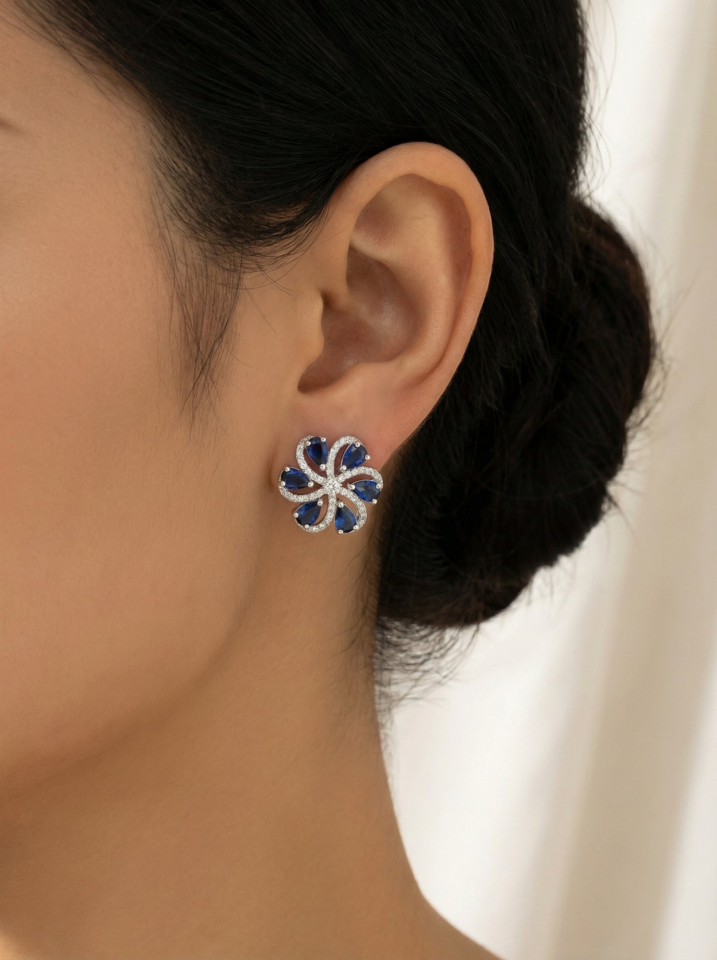 Blue Zirconia CZ Studs - [generated by Eldor AI]