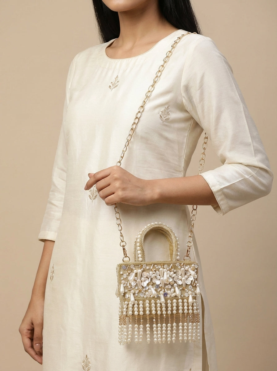 Ivory White Tiny Pearl Beads HandBag with Sling Chain - [generated by Eldor AI]