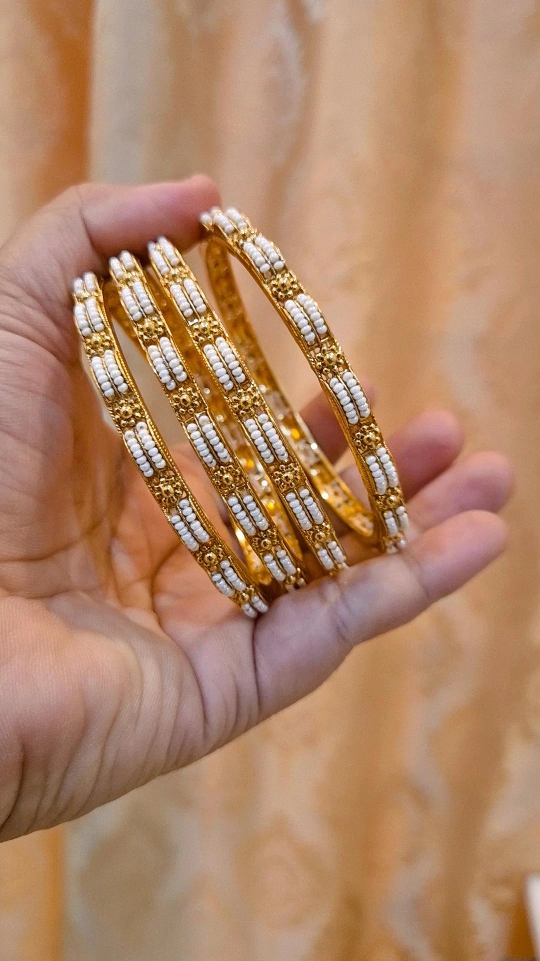 Sleek Elegant Pearl Gold plated Bangles- Set of 4